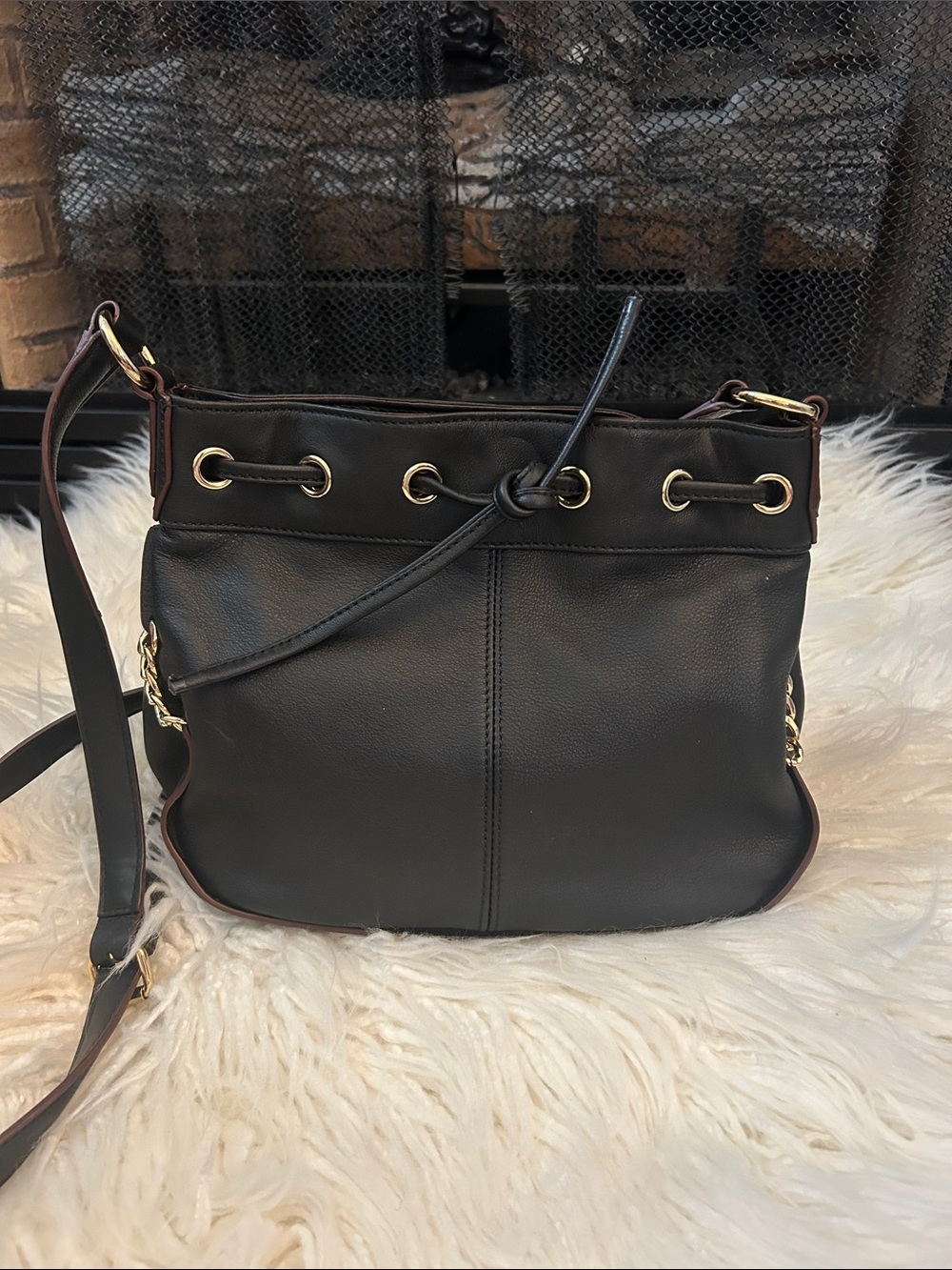 Perlina drawstring black leather bag . Excellent condition like new